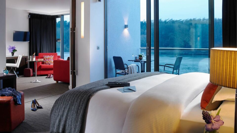 River view room with bed and living area